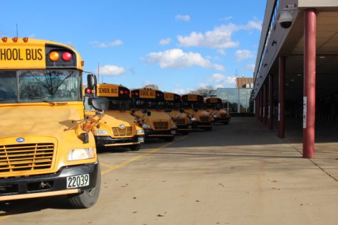 The buses of North Canton City Schools line up outside Hoover High School after the school day. NCCS, like many districts, is experiencing a staffing shortage. 