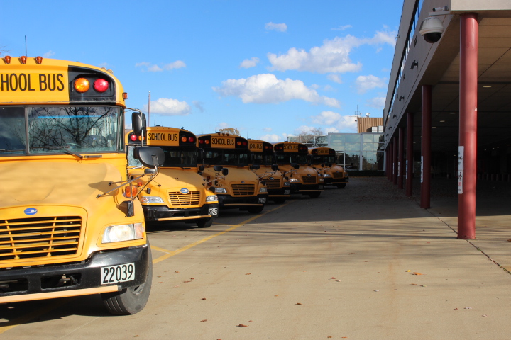 The buses of North Canton City Schools line up outside Hoover High School after the school day. NCCS, like many districts, is experiencing a staffing shortage. 
