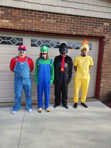 Mario and friends are ready for the movie! (from left to right) senior Owen Frank, junior Max Hayes, senior Rory Galbraith, junior Nakhi Kitchens pose solemnly for this great moment in world history.