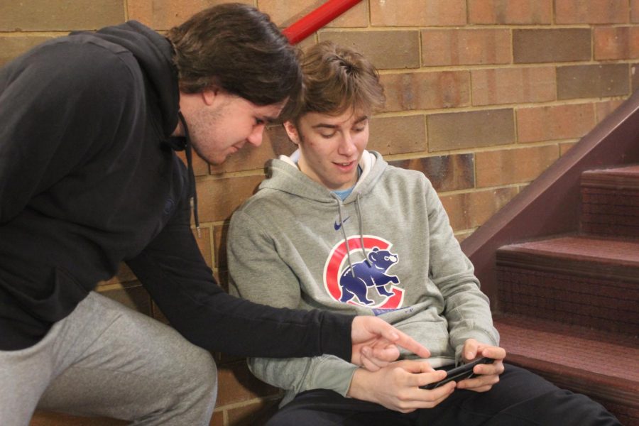 Seniors Drew Stangelo and Tyler Evans enjoy a game of Roblox after class.