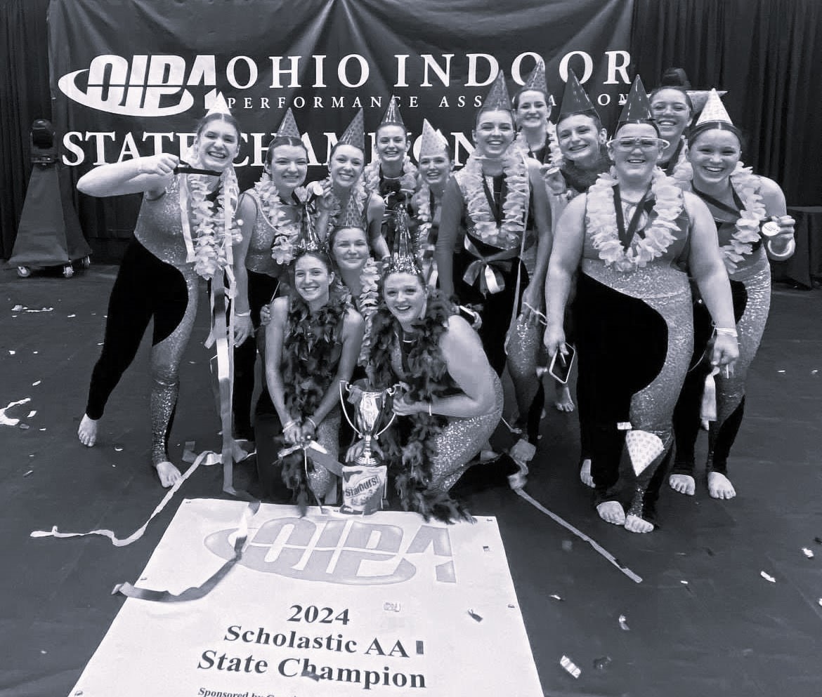 Hoover Colorguard celebrates state victory.