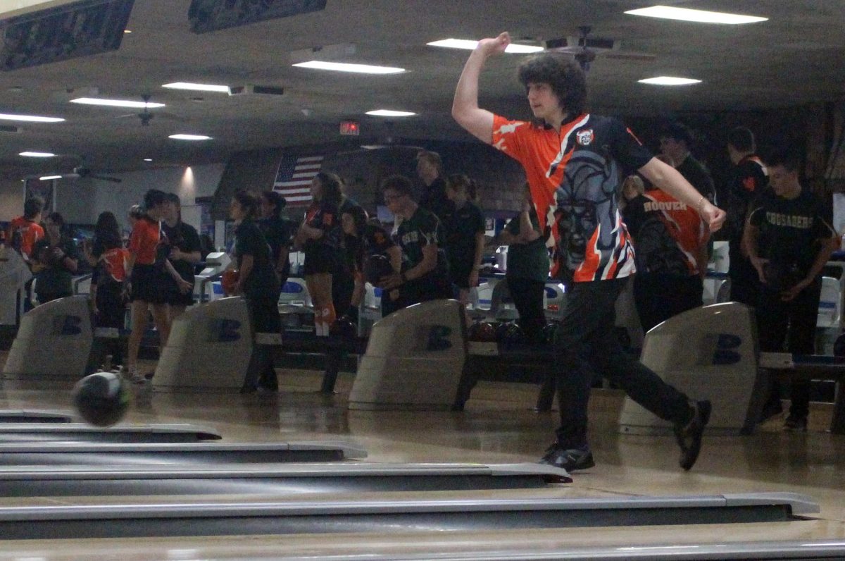  Freshman Tristan Shundry throws ball down the lane during Central Catholic warm-up Nov. 19.