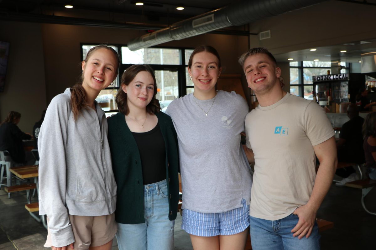 Editors pose for a photo at Boss ChickN
