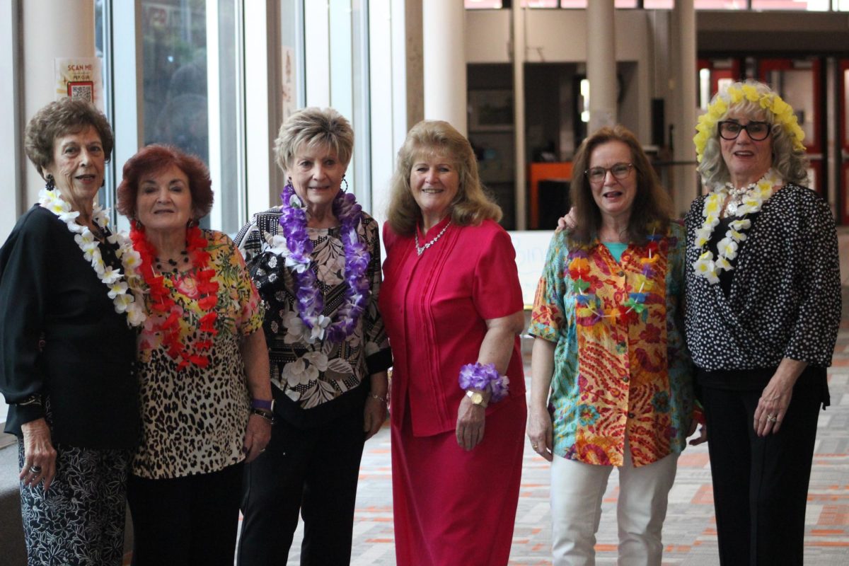 These lovely ladies smile from ear-to-ear as  they walk back from an intense bingo game.