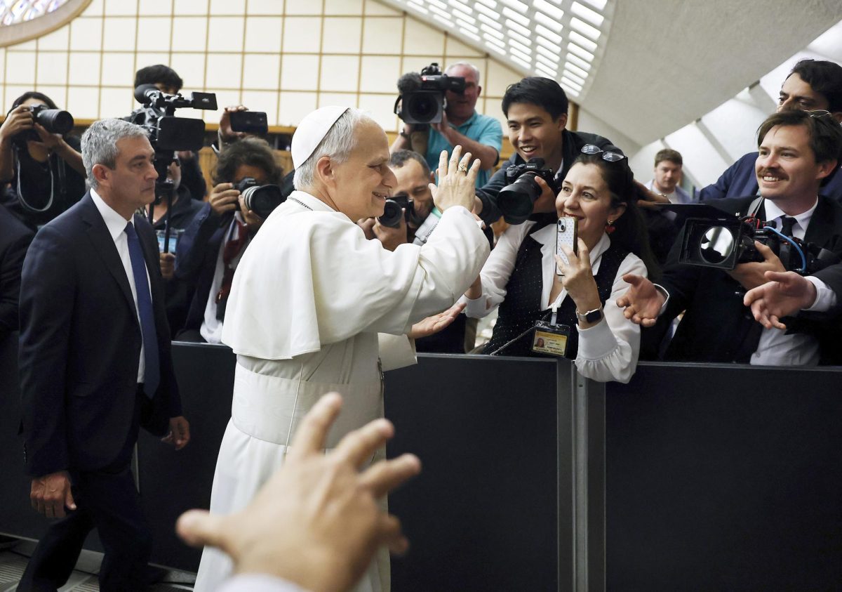 Pope Leo XIV greets media workers during an audience with thousands of journalists and media workers on May 12, 2025 at Paul VI Hall in Vatican City, Vatican. The audience with journalists has become a tradition among newly elected popes.