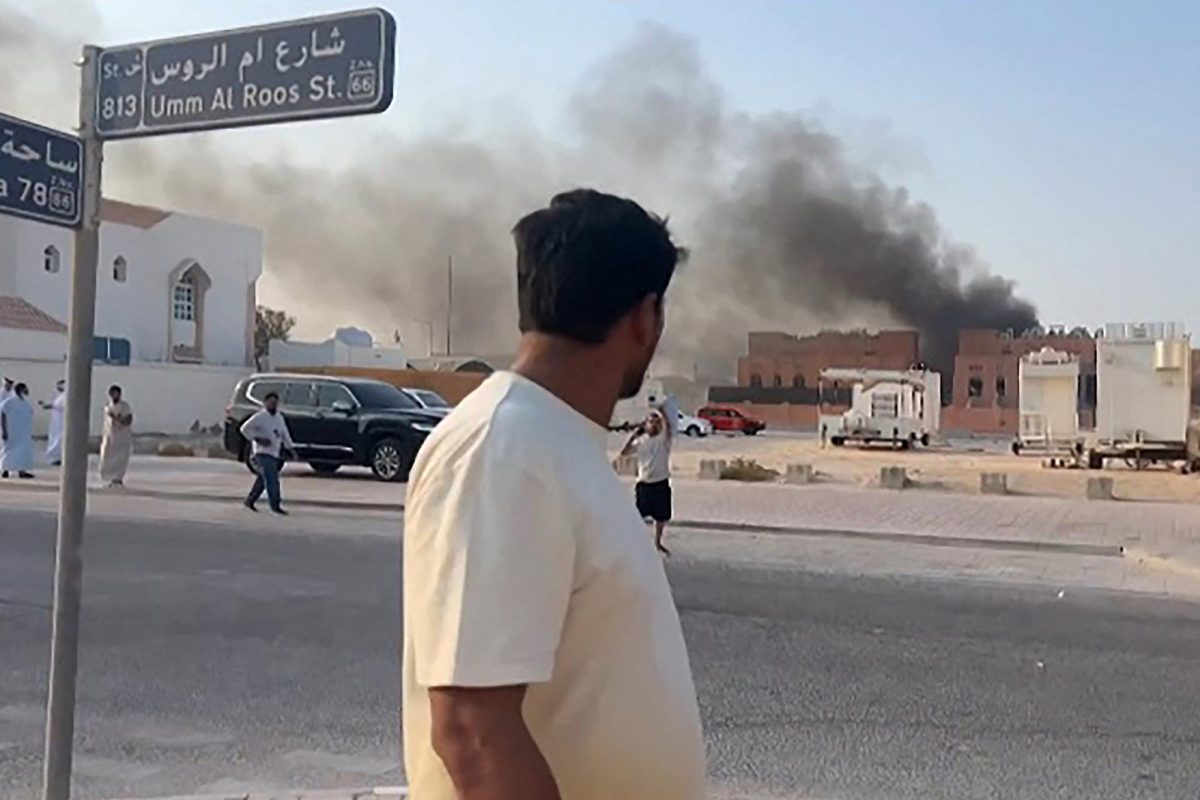  This frame grab taken from an AFPTV footage shows  a man looking at smoke billowing after explosions in Doha’s capital Qatar on Sept. 9, 2025. An Israeli military official told AFP that the military had carried out air strikes on Doha on Sept. 9 in an operation targeting senior leaders of Palestinian militant group Hamas.