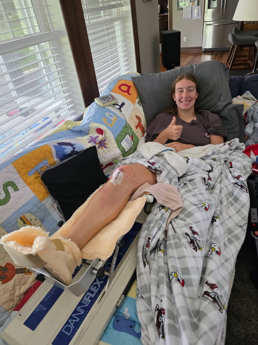 Senior Julia Frantz smiles for a photo taken Jun. 23. One day after surgery, she remained optimistic at the future ahead.