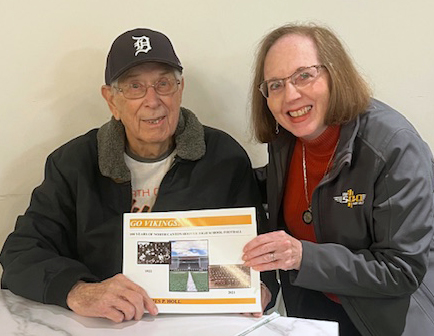 Author and No-Ca-Hi alumnus Mr. Jim Holl poses with Mrs. Shirley Dobry at a book signing at New 
Berlin Brewing Co. Nov. 8. Mrs. Shirley Dobry/used with permission n [below] Mrs. Susie Hertler VanVranken 
was 1974 graduate of Hoover High School, and she served as an NCCS teacher and school board member. She 
passed away from ALS in 2021. The proceeds from Mr. Holl’s book will go to the Susie V. Foundation. n Viking 
Views stock photo/The Van Vranken family/used with permission