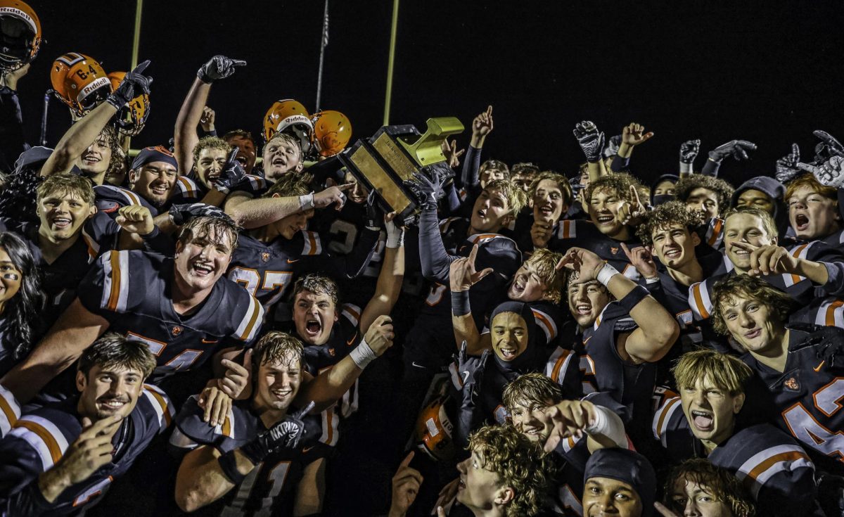 The 2025 varsity football team celebrates winning The Rail back after the rival game against Jackson Oct. 24. 
The Vikings beat the Polar Bears 35-14 on the last regular season game of the year.
