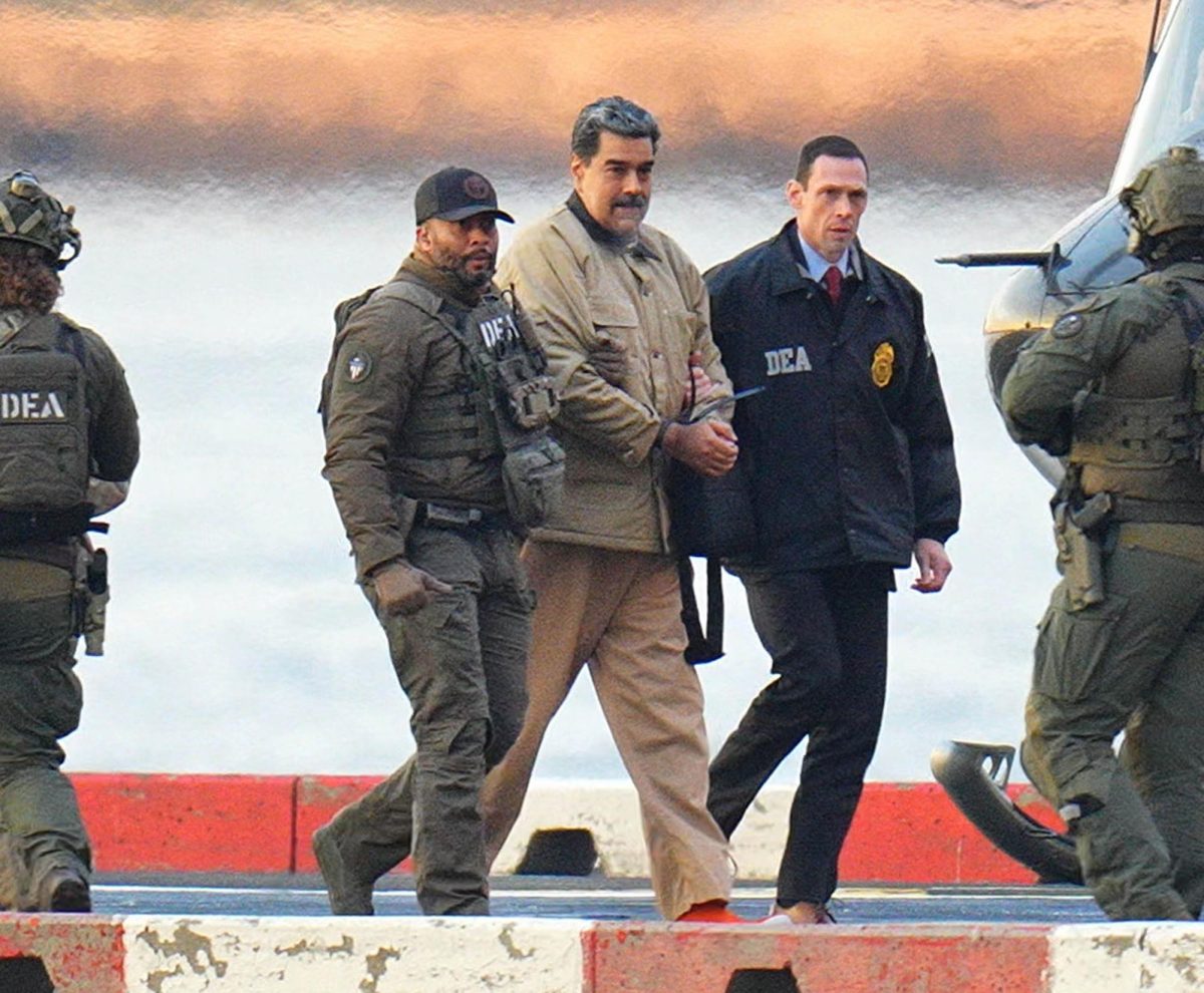 Venezuelan President Nicolas Maduro in handcuffs after landing at a Manhattan helipad, escorted by heavily armed federal agents as he and his wife  make their way into an armored car en route to a federal courthouse, on Jan. 5,  2026, in New York City