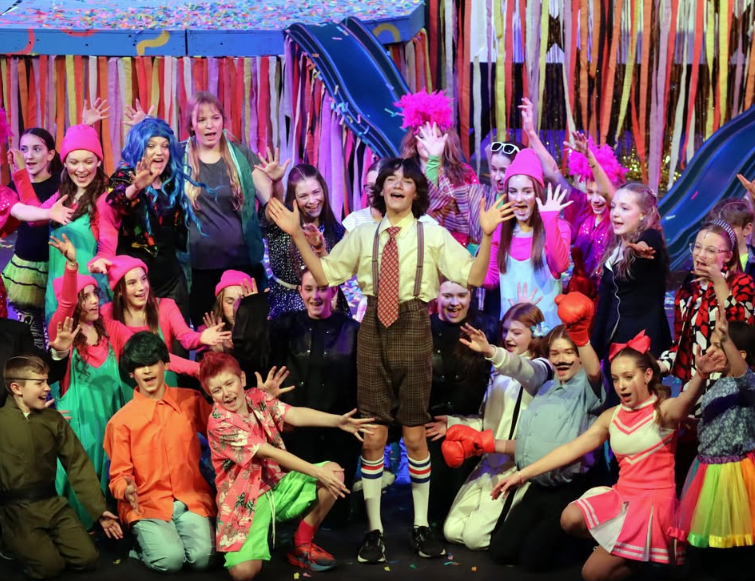Students from North Canton Middle School perform The SpongeBob Musical: Youth Edition Jan. 15–17 in Hoover Hall. The production featured 
energetic musical numbers, colorful characters and choreography inspired by the Nickelodeon animated series. NCMS eighth grader Gabe Factora  [center] portrayed SpongeBob