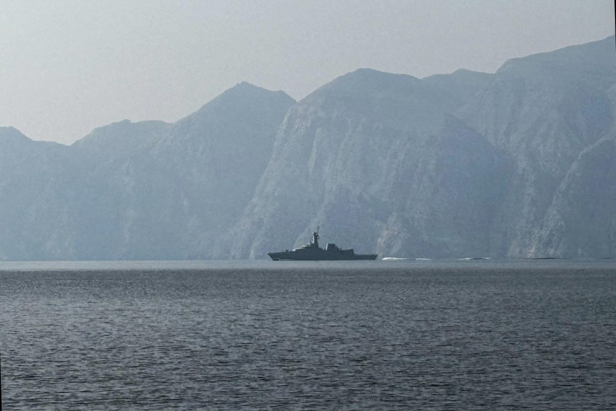 A naval vessel is seen sailing in the Strait of Hormuz, a vital waterway through which much of the world’s oil and gas passes, on March 1, 2026